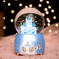 Blue base snow globe music box with white castle and golden carriage relief detail - 027 Castle Blue / Large 100 Snow+Light+Music