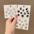 Set of assorted pearl and decorative enamel safety pins in black, white and gold - Biyue Series Style