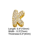 Macro shot of gold letter K pendant with clear zircons and detailed dimensions - Letter K