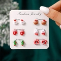 Detailed view of 6-pair Christmas stud earrings set on a Monday to Saturday card - Santa Reindeer Glove Rabbit Snowman Red House Set(SD62560)
