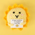 Handmade knitted sunflower doll in yellow and orange holding a little sunshine card - Yellow Smiley Sun Doll