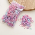 Close-up of colorful macaroon elastic hair bands for girls in a large value bulk pack - Purple Series (1000Pcs)