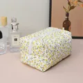 Portable floral quilted makeup bag with yellow flower pattern and zip closure - Yellow Floral