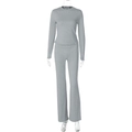 Detail view of grey long sleeve top and flared pants set with fine knitted texture - S / Gray
