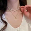 Double-layered gold necklace featuring a pearl choker and polished heart pendant charm - 22# Necklace-Gold (2pcs Set)