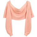 Detail of pink knitted wrap shawl with sleeves featuring soft ribbed texture and wide neckline - Watermelon red