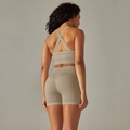 Detail of seamless yoga set with cross-back sports bra and high-waist lifting shorts - S / Top And Bottom / Cross Bra + Shorts / Khaki