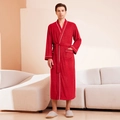 Men's red long-sleeved bathrobe with white piping and belted waist in home setting - Rouge Red (Men)