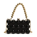 Detail of black acrylic clutch with 3D bubble texture, gold beaded handle and chain - Black