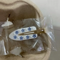 Hair clip featuring blue rhinestone flowers and white pearls on a gold duckbill base - Blue Pearl Diamond