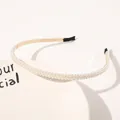 Close-up of elegant double-row pearl headband with gold metal base and black comfort tips - Double Row Large Pearls