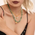 Collier double épaisseur avec perles vertes, feuille de ginkgo et pendentif ovale - Collier double rang doré