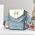 Blue and white quilted bucket bag with pearl swan charm and pink MASK strap - Sky Blue