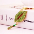 Creative keychain featuring a green rhinestone-studded lip and tiny lipstick pendant - Green