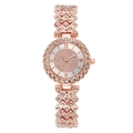 Macro view of rose gold women watch with rhinestone dial and diamond-set metal link band - Rose Gold Single Watch
