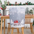 Christmas chair cover featuring three gnomes and white snowflakes on gray fabric - Grey Chair Cover