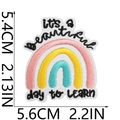 Close-up of rainbow embroidery patch with 'it's a beautiful day to learn' quote - It's a beautiful day to learn