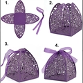 Purple laser-cut floral candy box tutorial showing four-step folding process with ribbon - Pearlescent Light Purple