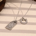 Collar de acero inoxidable plateado con colgantes de herradura y placa rectangular - Color Acero