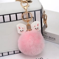 Pink faux rabbit fur pom pom keychain with a white rhinestone bow and gold lobster clasp - Deep Pink - Soft Glue Bow