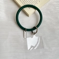 Dark green silicone phone wrist strap with silver metal clasp and clear connector pad - Dark Green