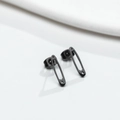 Detail view of matte black safety pin earrings in premium stainless steel finish - Black Pin Style (GED458B)