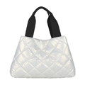Minimalist silver quilted tote bag with black webbing handles on a white background - White