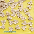 Detailed view of 13mmx15mm cream butterfly beads with vintage brown texture for DIY jewelry - Butterfly (13mmx15mm)
