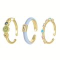 Detailed close-up of three-piece adjustable gold ring set with colorful enamel and crystals - 3Pcs Set Fashion Open Rings (Light KC Gold)