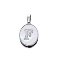 Macro shot of oval shell pendant featuring a polished silver metal letter F inlay - Steel Letter F