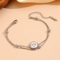 Macro detail of silver stainless steel double-layer bracelet with heart pendant and clasp - Steel Color Double Layer Heart Bracelet (I115)