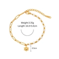 Detail showing gold paperclip chain and white bead link with sun pendant and调节链 - Gold Sun Tag Bracelet