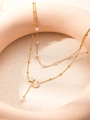 Collier double couche doré en titane avec pendentifs étoile lune et perles blanches - Étoile Lune Double Couche