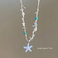 Detalle del collar de cordón de 70 cm con estrella de mar azul y cuentas de nácar - Blanco (Collar Tejido de Estrella de Mar y Gravilla)