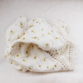 Close-up of white cotton baby blanket with yellow floral prints and lace fringe - 100x120cm / Beige Floral