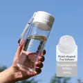 600ML frosted transparent plastic sports bottle with white lid and portable strap - 600ml / Clear White