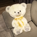 Cute beige teddy bear plush toy with yellow ribbon on a sofa, sparkly silver paw detail - 35cm (Skin/No Filling) / White
