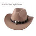 Detail of camel wool cowboy hat featuring ethnic woven band and silver bull skull charm - Tibetan Cloth Style / Camel