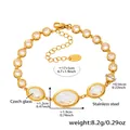 Dettaglio del bracciale in acciaio inossidabile dorato con vetro ceco ovale e chiusura a moschettone - Oro Vetro Bianco (E655)