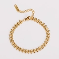 Detalle de pulsera bañada en oro 18KGP con eslabones en forma de hoja y cierre ajustable - Dorado