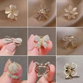 Elegant rhinestone and opal pins in flower, bow, and clover shapes for waist tightening - No. 34 Clutch Back Pin 9-Piece Set