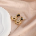 Detail of gold triple-hoop earrings featuring rectangular black zircon on silk fabric - Gold (E00288-10)