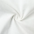 Macro detail of breathable white cotton fabric showing smooth plain weave and soft texture - White-100% Cotton