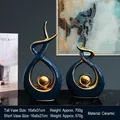 Abstract streamline ceramic decor set in deep blue and gold finish for modern living rooms - Morning Song Style Blue Gold Pair - Large