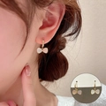 Elegant gold bow earrings with white pearl-like inlay and delicate hoop clasp design - Gold Bowknot Shell Pendant