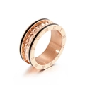 Rose gold ring with Roman numeral engravings and pyramid stud details on black enamel - US 7 / Rose Gold (KR92030-GC)