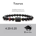 Detail of matte black Taurus zodiac bracelet with tiger eye stone and gold spacers - No Card / Taurus