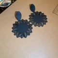 Matte black hollow flower earrings with intricate carved petals in a vintage style - Matte Black Hollow Out Floral Style (HE18721)