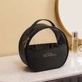 Beauty case rotondo in pelle PU nera con finestra in PVC trasparente e maniglia - Grande / Nero