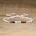 Adjustable white moonstone bead bracelet with colorful 7 chakra stones and gold spacers - No.69 White & Seven Chakra